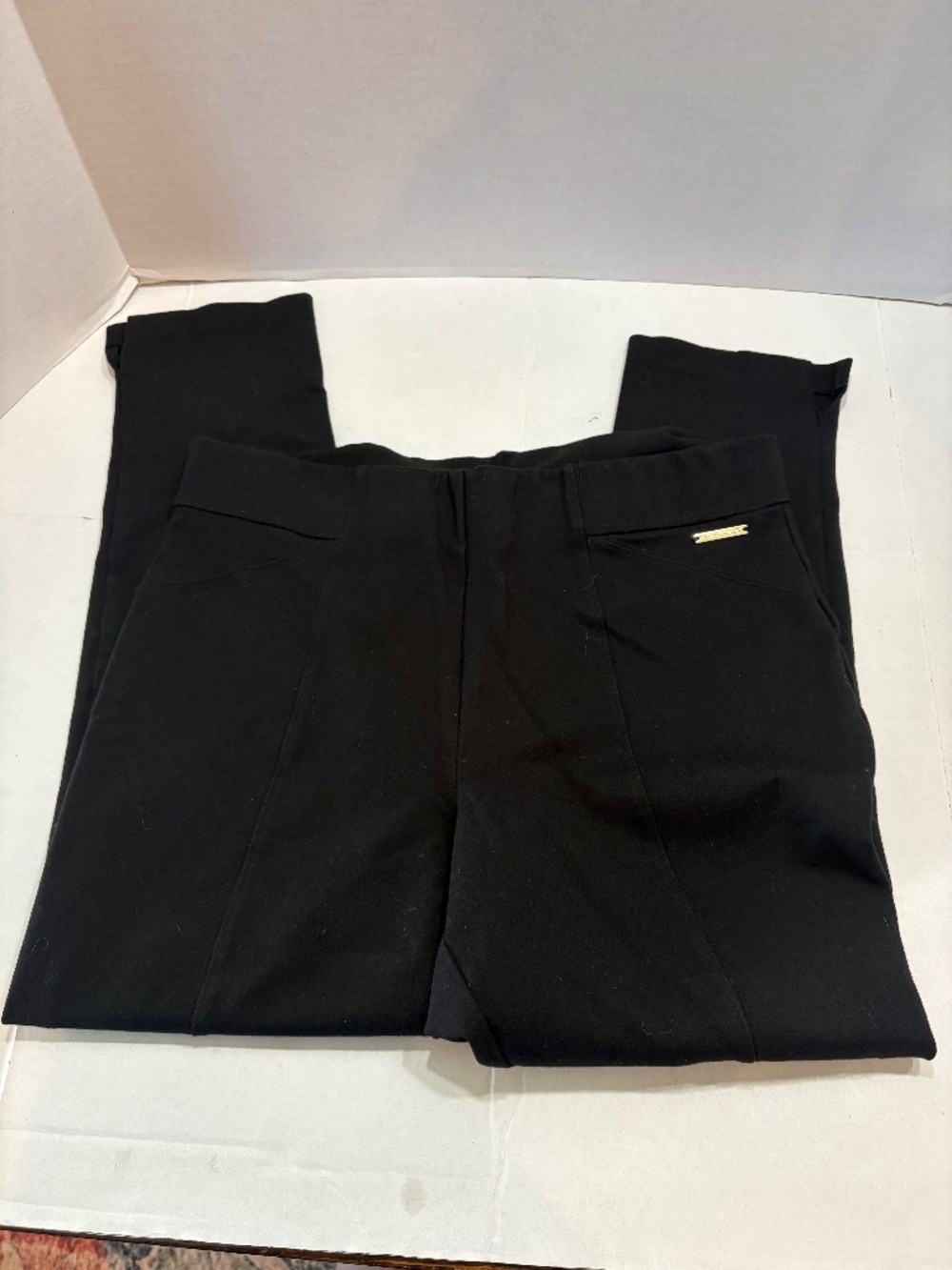 Michael Kors black stretch band and stretch material, size large, 25" inseam